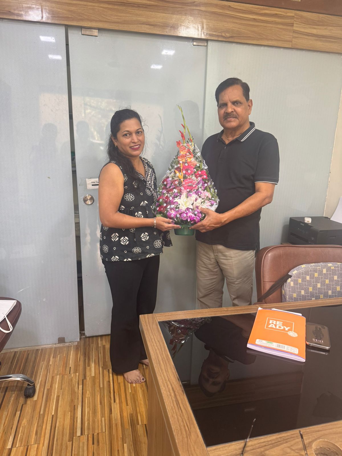 Client felicitation at the office